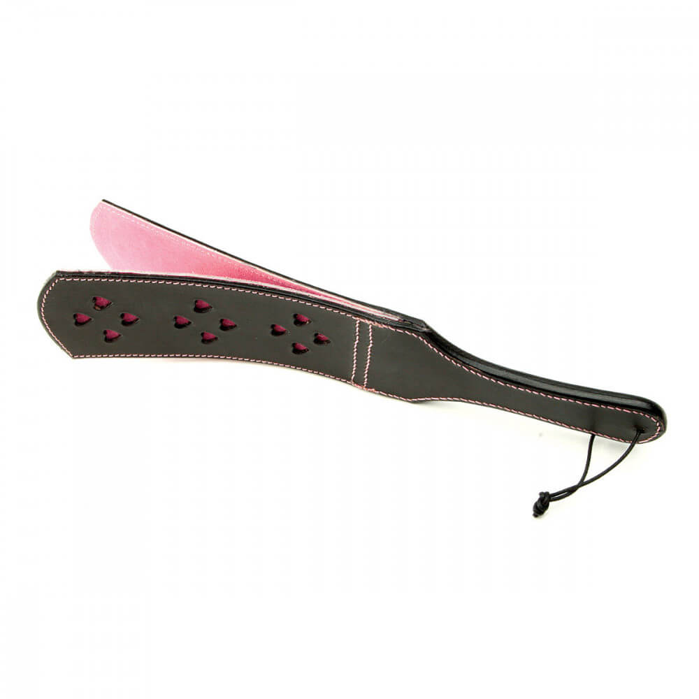 Ruff Doggie Styles Double Heart Slapper against a white background. The cute 12 hearts etched out on the top of the slapper show the pink leather material underneath. The two layers are pulled apart to showcase the "slapper" design. | Kinkly Shop