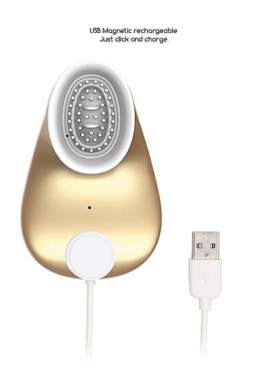The Shots Twitch Innovations's USB charging cable is plugged into the base of the vibrator. The text on the image reads "USB Magnetic rechargeable. Just click and charge." | Kinkly Shop