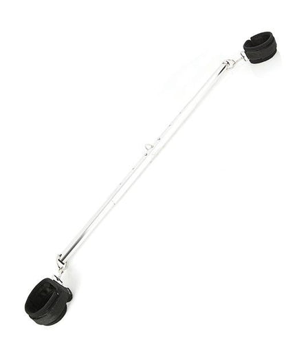 The Sportsheets Expandable Spreader Bar and Cuff set includes a long, metal bar with two bondage points on the end of each side of the bar. Attached to these each one of these bondage points is a black bondage cuff. Not shown, but the bar can be taken apart into three pieces for easy storage. | Kinkly Shop