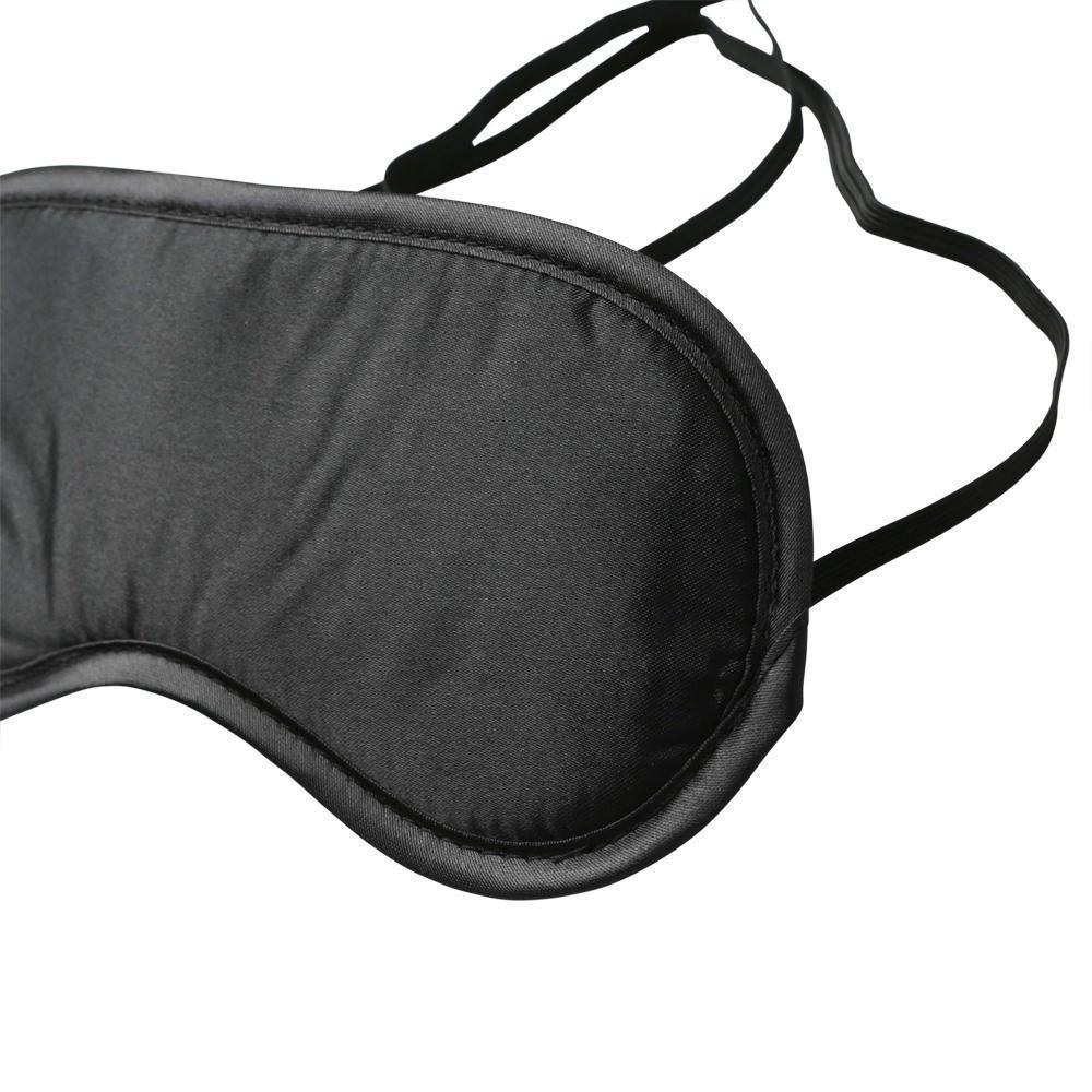 A close-up of the black blindfold included in the Sportsheets Intro To S&M Kit shows the shiny, soft-looking material of the blindfold as well as the stiffer edges that are sewn onto the blindfold for structure. | Kinkly Shop