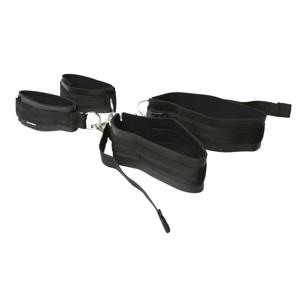 The set of the Sportsheets Thigh to Wrist Bondage Cuff Set sitting together and clipped together on a plain white surface. | Kinkly Shop