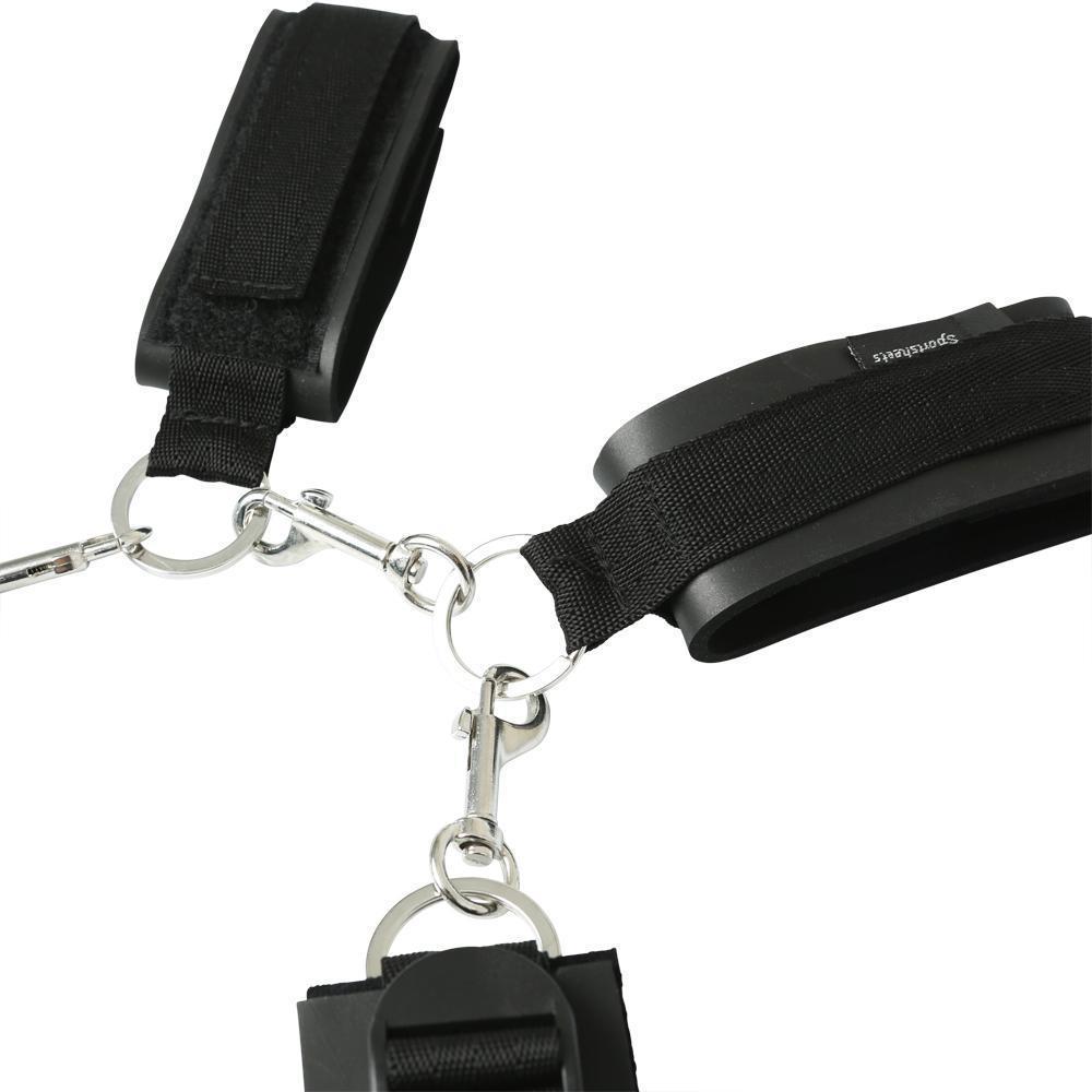 Close-up of the one-sided clips and O-rings shows how the clips easily fasten each one of the bondage cuffs together. | Kinkly Shop