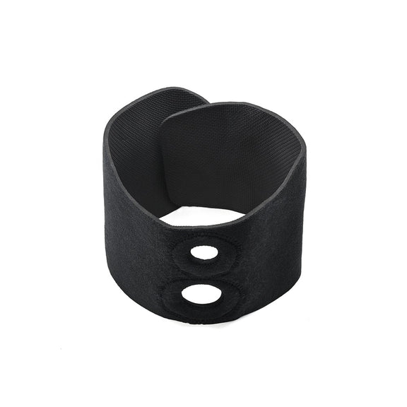 The Sportsheets Dual Penetration Thigh Strap-On Harness fastened onto itself in a circular fashion against a plain white background. This view showcases the design of the Hook and Loop fastener design while also showcasing the two built-in O-ring holes. The two holes are clearly different diameters. | Kinkly Shop