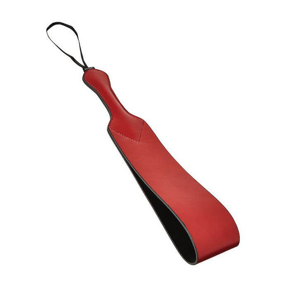Sportsheets Saffron Loop Paddle up against a white background. The paddle is a long strand of PU Leather looped in on itself for a large loop at the end of the paddle. | Kinkly Shop