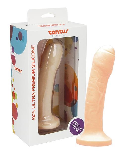 Tantus Uncut #2 dildo lined up next to its packaging. | Kinkly Shop