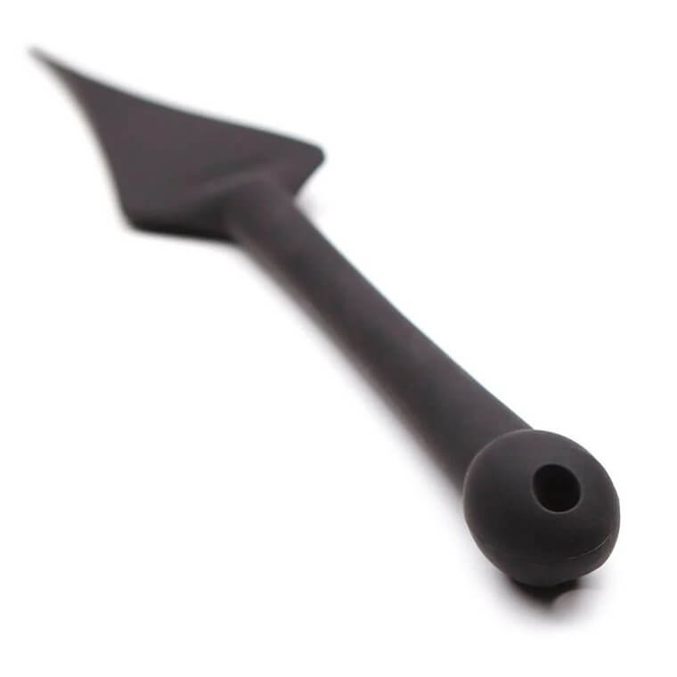 Close up of the handle of the Tantus Dragon Tail. Not only does this showcase the thicker bulb at the end of the handle for easier handling, it also showcases the hole throughout the handle's end for you to tie a loop for easy storage. It also showcases how slender and smooth the handle is to be used for penetration - if desired. | Kinkly Shop