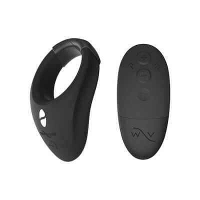 The We-Vibe Bond penis vibrator ring sitting next to the remote control for the set | Kinkly Shop