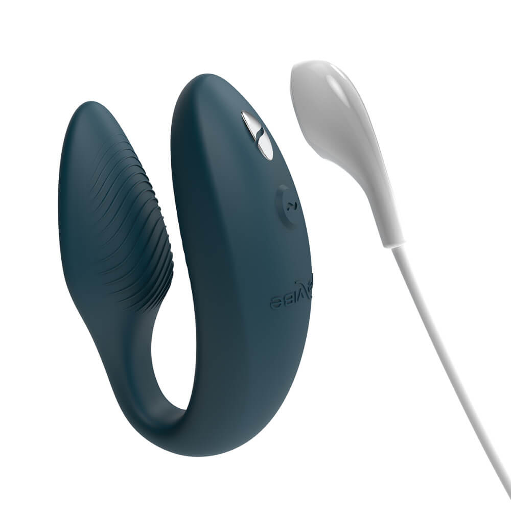 The magnetic charging cable shown near the two pronged magnetic charging port. | Kinkly Shop