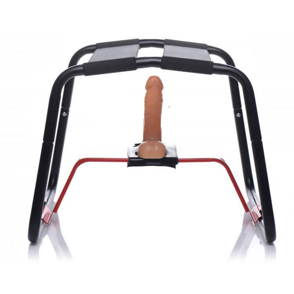 The XR Bangin' Bench with the dildo riser set up underneath it. A dildo is strapped onto the harness on the dildo riser to showcase how the XR Bangin' Bench can be used for hands-free dildo pleasure. | Kinkly Shop