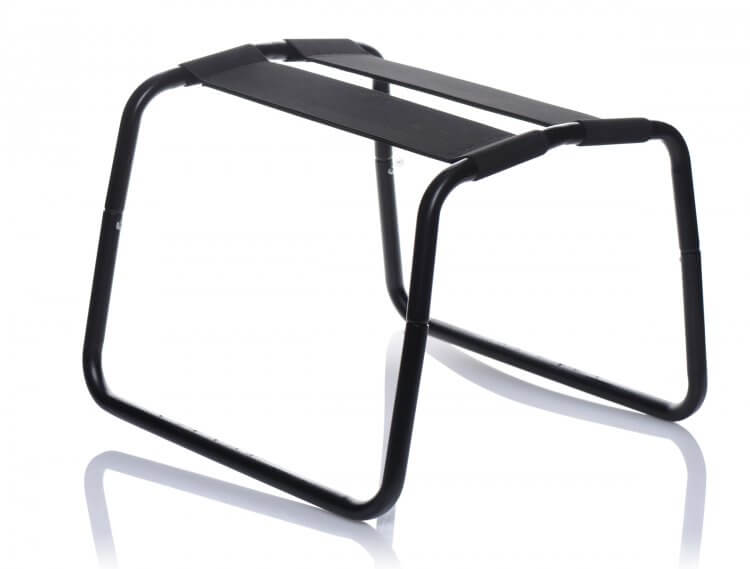 The XR Bangin' Bench up against a white background. The frame of the XR Bangin' Bench is clearly a firm, metal frame while the elastic bands hang across the top of the XR Bangin' Bench. | Kinkly Shop