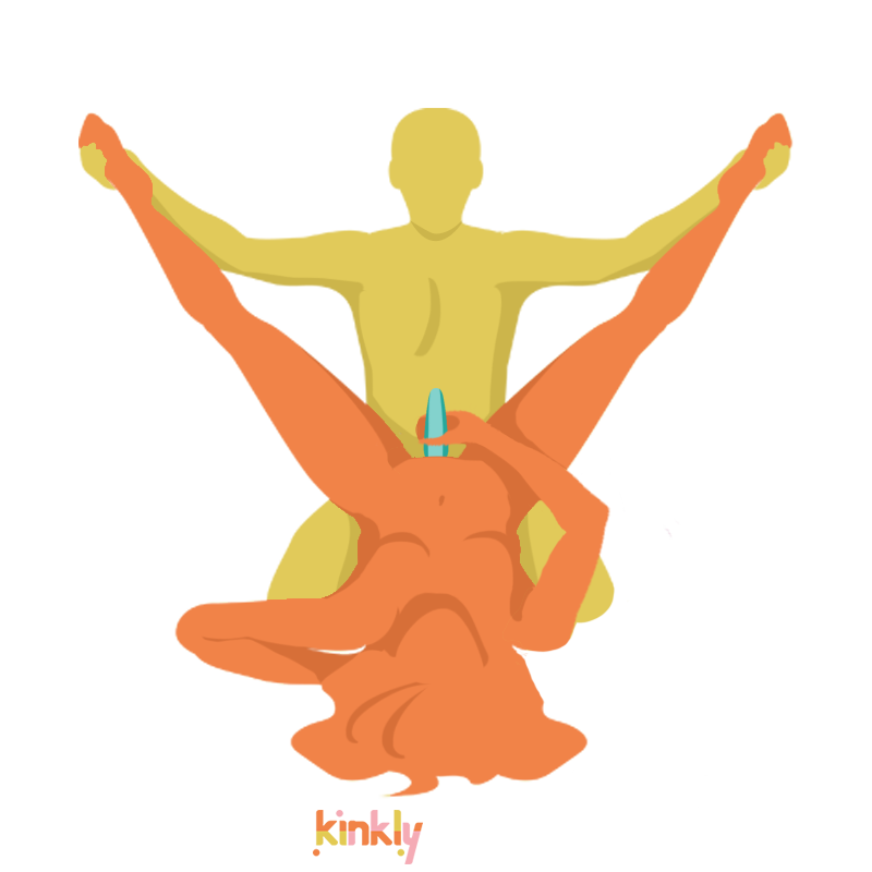 Happy Scissors sex position. The receiving partner is laying on their back with their legs spread wide. The penetrating partner is kneeling in front of the receiver's spread open legs. The receiving partner then props their hips up on the penetrating partner's lap for intercourse. The illustrated position also shows the receiver using a sex toy on themselves. | Kinkly