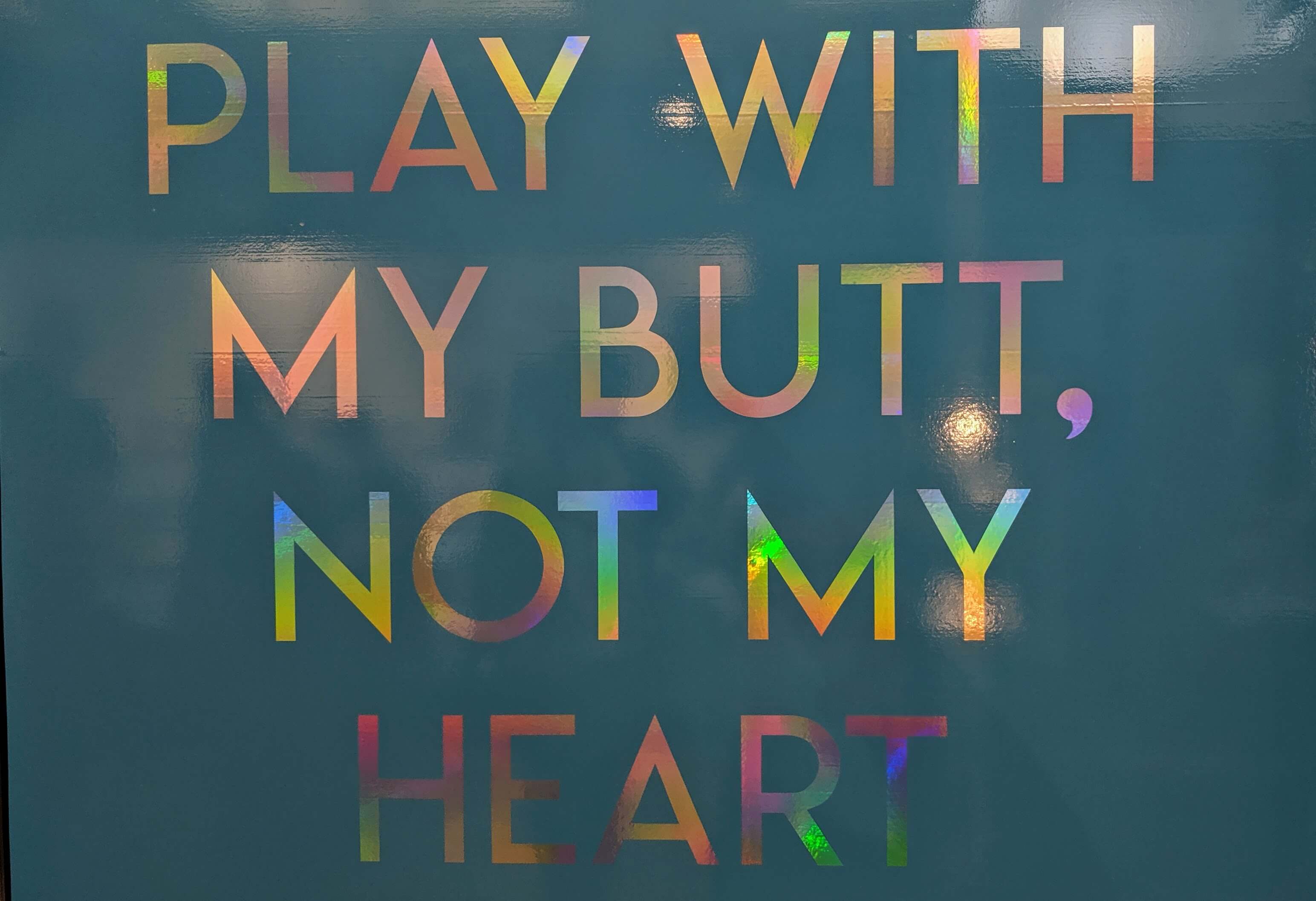 Sign: Play with my butt, not with my heart