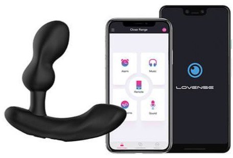 The Lovense Edge 2 sits next to a cell phone. The cell phone is opened to the Lovense app that allows the user to control the functionality of the Lovense Edge 2. | Kinkly Shop