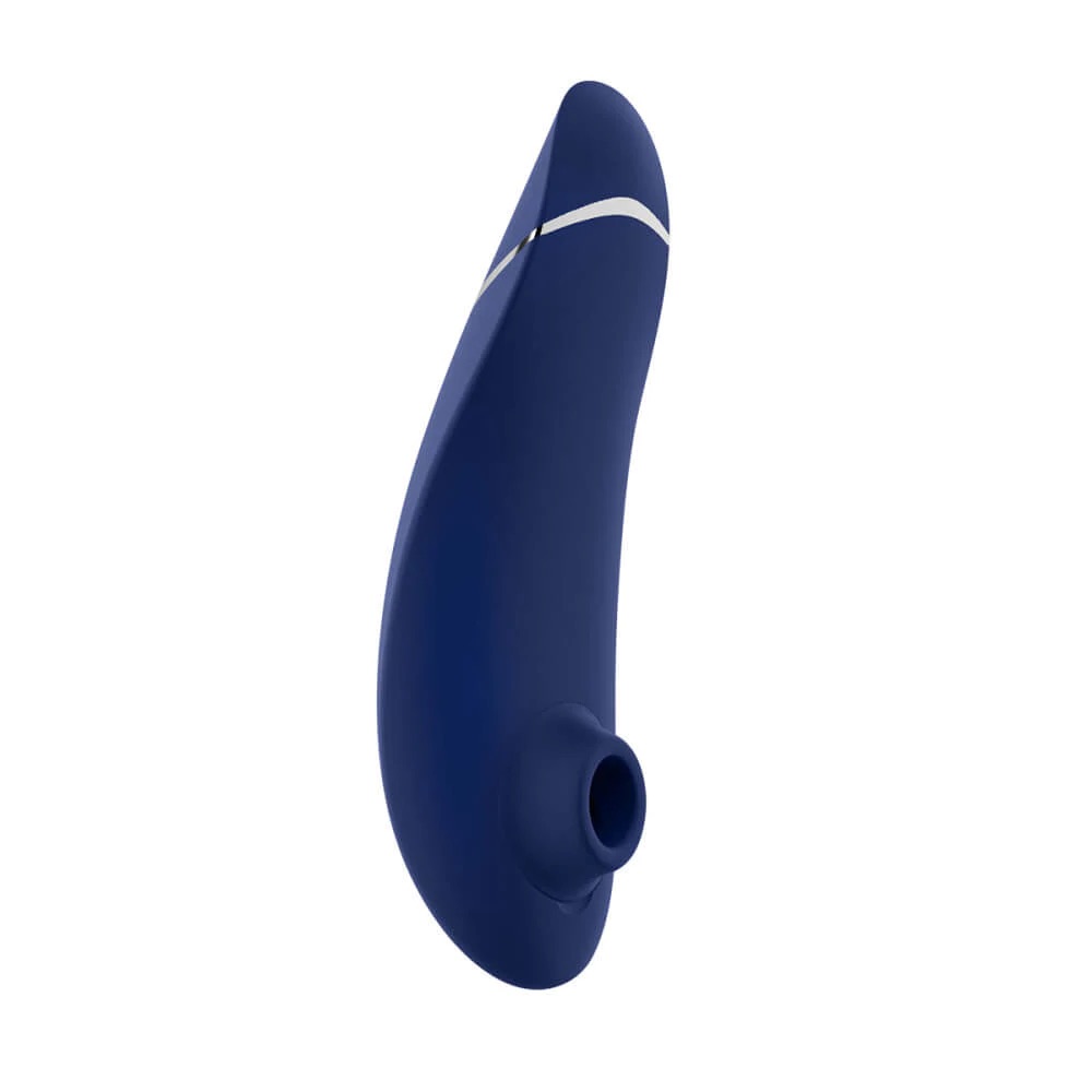 The Womanizer Premium 2: A six-inch finger-shaped vibrator with a white stripe around the circumference at the top, where the handle is, and a circular suction cup at the bottom for clitoral stimulation.