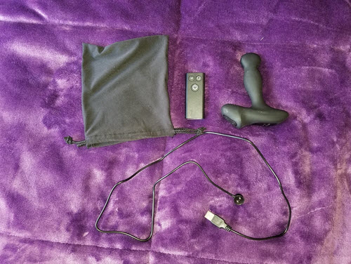Nexus Revo Slim prostate massager with travel bag, charging cable and remote