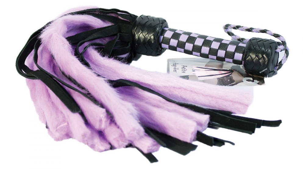 Example of a flogger made from faux fur. The flogger is a bright purple and black color with faux fur tails that look extremely fluffy and soft.