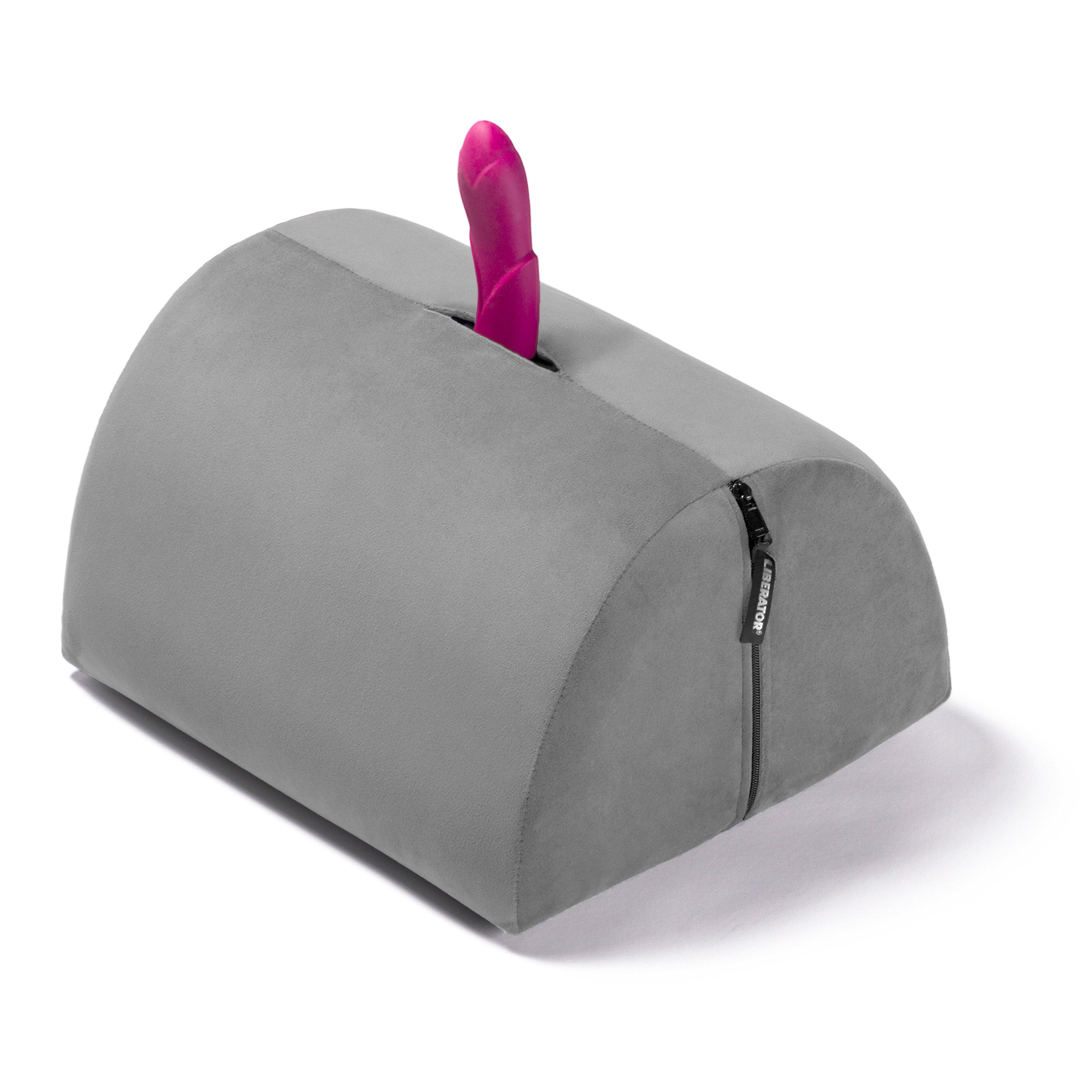 The Liberator BonBon: A gray sex toy mount with a flat base and a rounded top. Poking out from the top is a pink dildo.