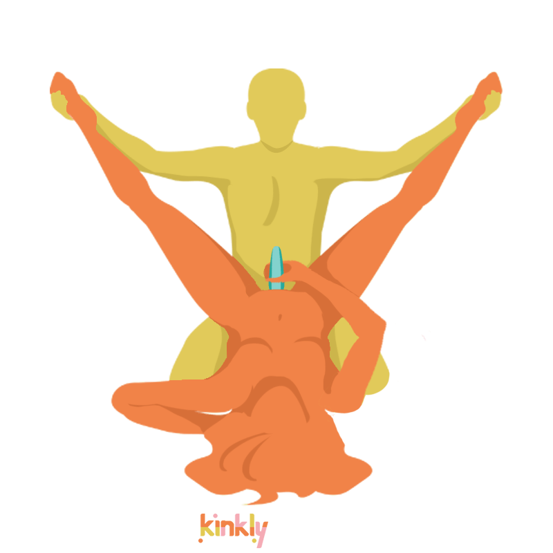 Happy Scissors sex position. The receiving partner is laying on their back with their legs spread wide. The penetrating partner is kneeling in front of the receiver's spread open legs. The receiving partner then props their hips up on the penetrating partner's lap for intercourse. The illustrated position also shows the receiver using a sex toy on themselves. | Kinkly