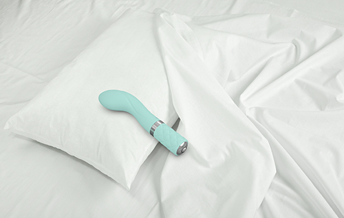 Pillow Talk Sassy Wand vibrator on bed