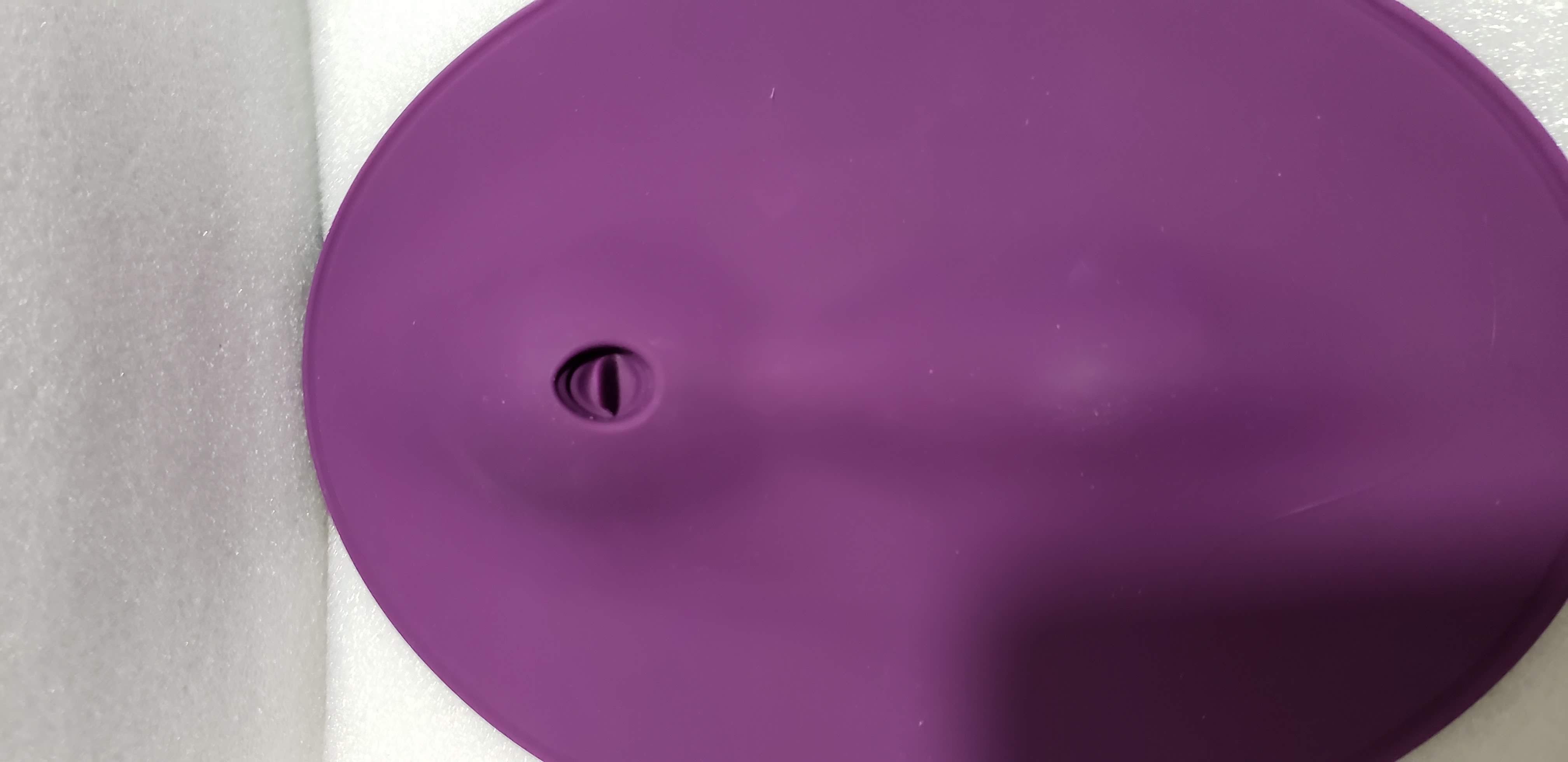 Orion VibePad 2: a purple oval with a hole in the center near the top.