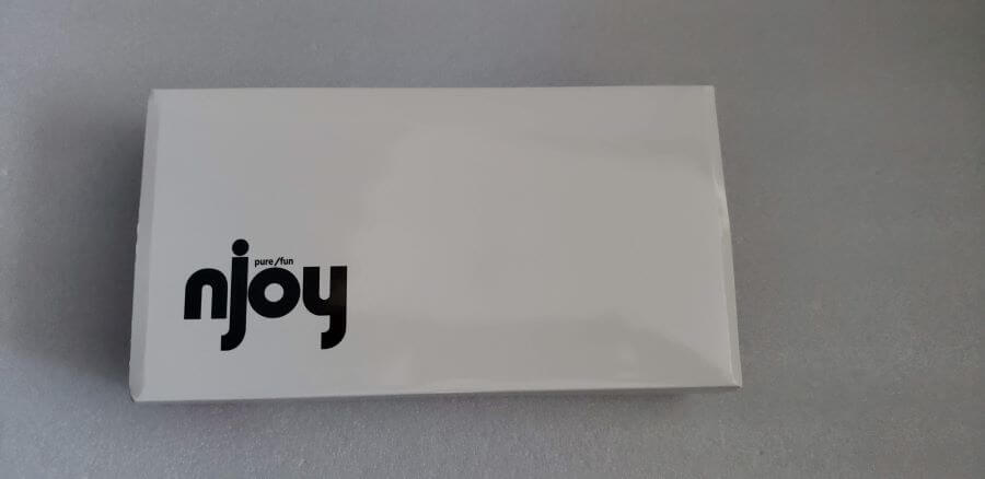 A white cardboard box with "njoy" printed on the box.