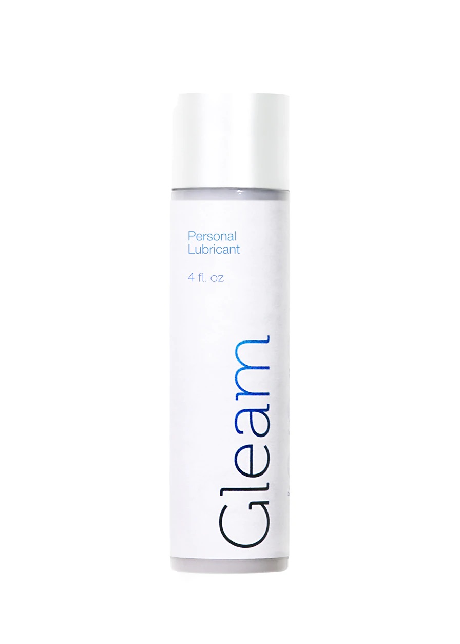 Gleam Lube: A cylindrical bottle with a white label and the word "Gleam" printed along the right-hand side in black and blue gradient font. 