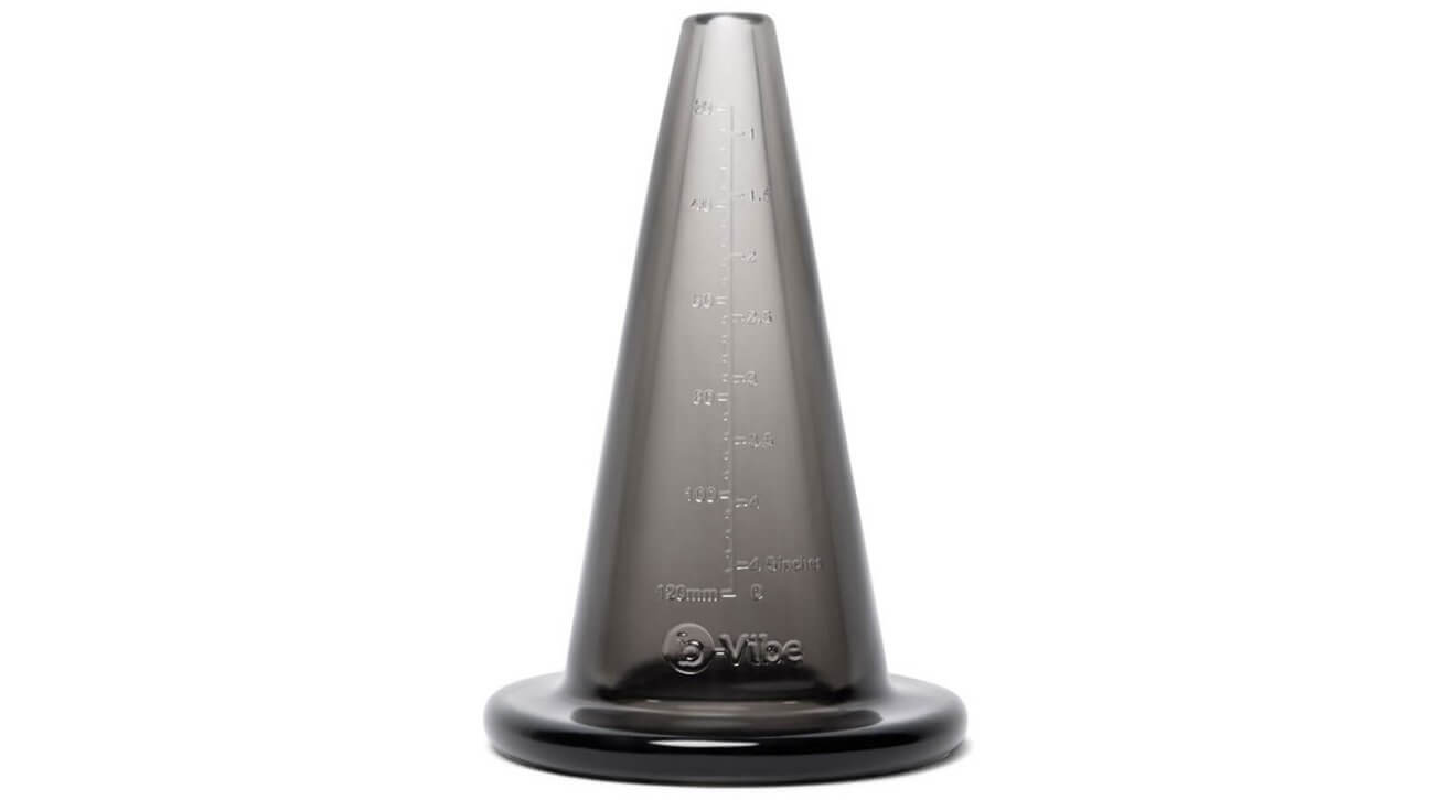 The b-Vibe mASSter's Degree Anal Set hollow cone up against a white background. It is made from a black, slightly see-through plastic. There are measurements along the entire length of the cone. | Kinkly Shop