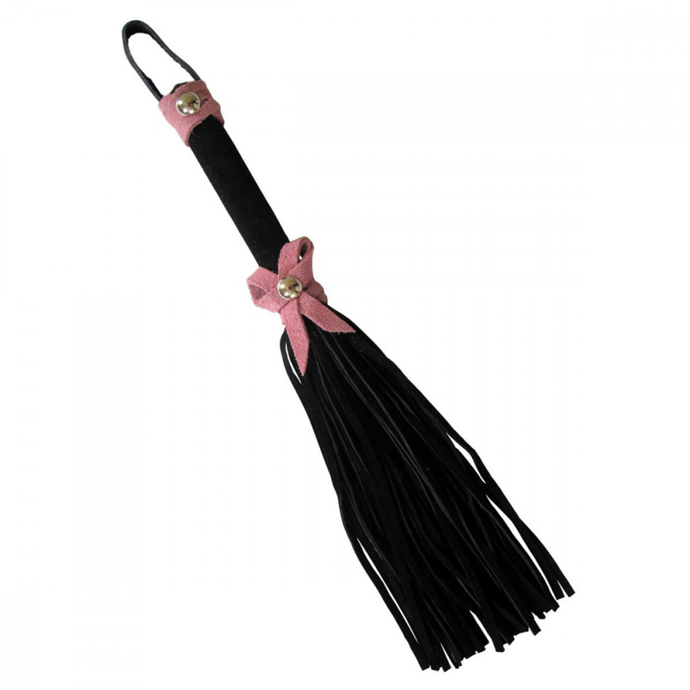 Small black leather flogger with pink bow detail for BDSM play