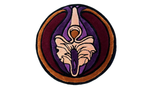 Round rug in purples and maroons that looks like a vulva