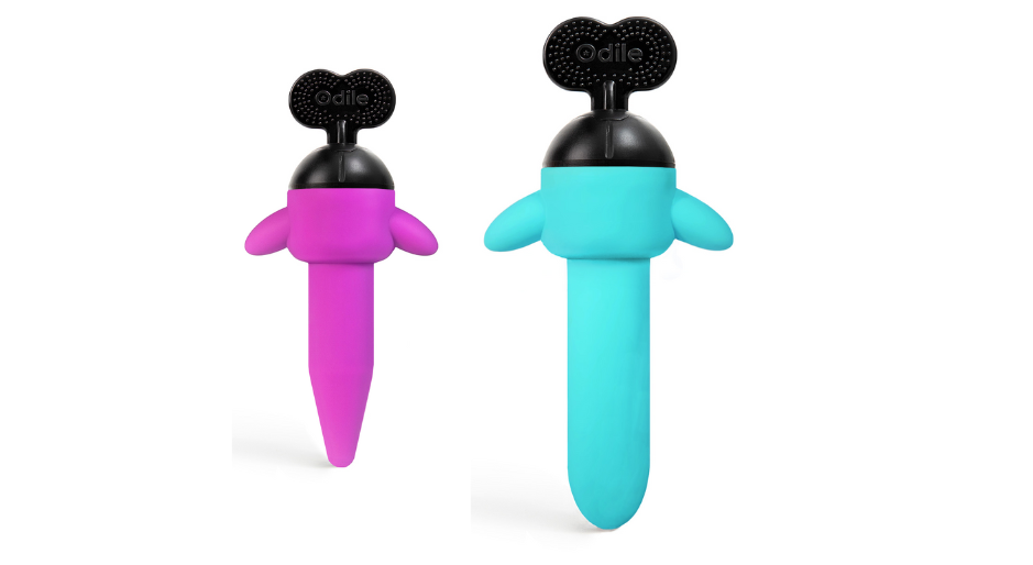 Two Odile dilating butt plugs. The left butt plug is fuschia and the right butt plug is neon blue. Both plugs feature a long colored end, to be inserted into the anus, and are topped with a black dial that can be turned to expand the dilator.
