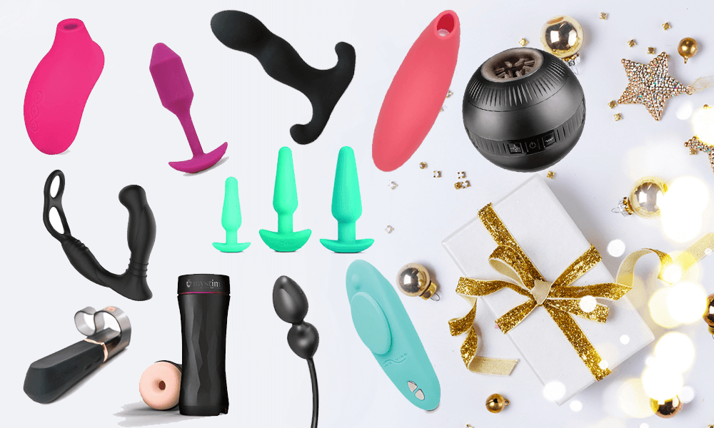 various colorful sex toys and wrapped gift with ornaments